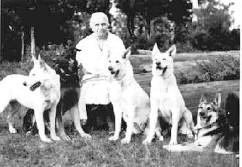 Geraldine Rockefeller Dodge with her German Shepherd Dogs